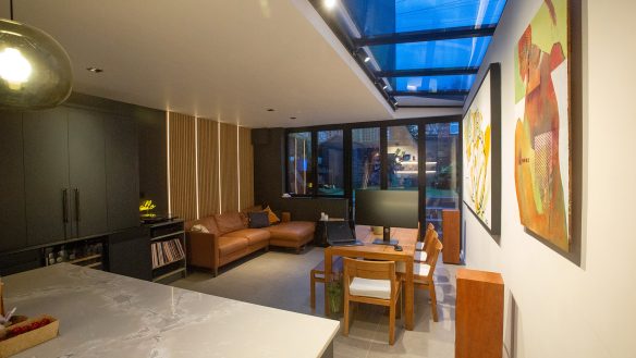 modern living extension area with sliding doors and rooflights