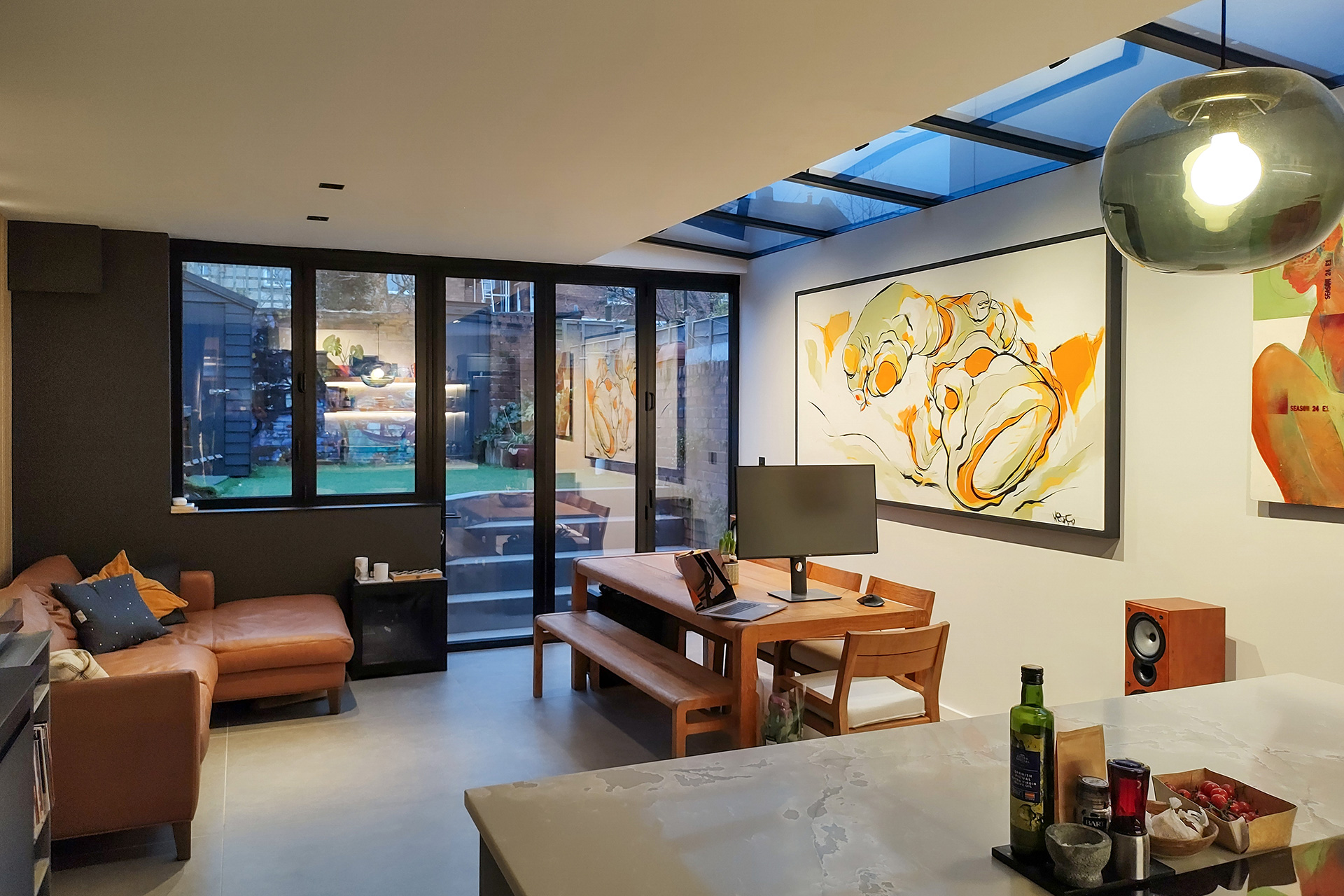 modern living extension area with sliding doors and rooflights