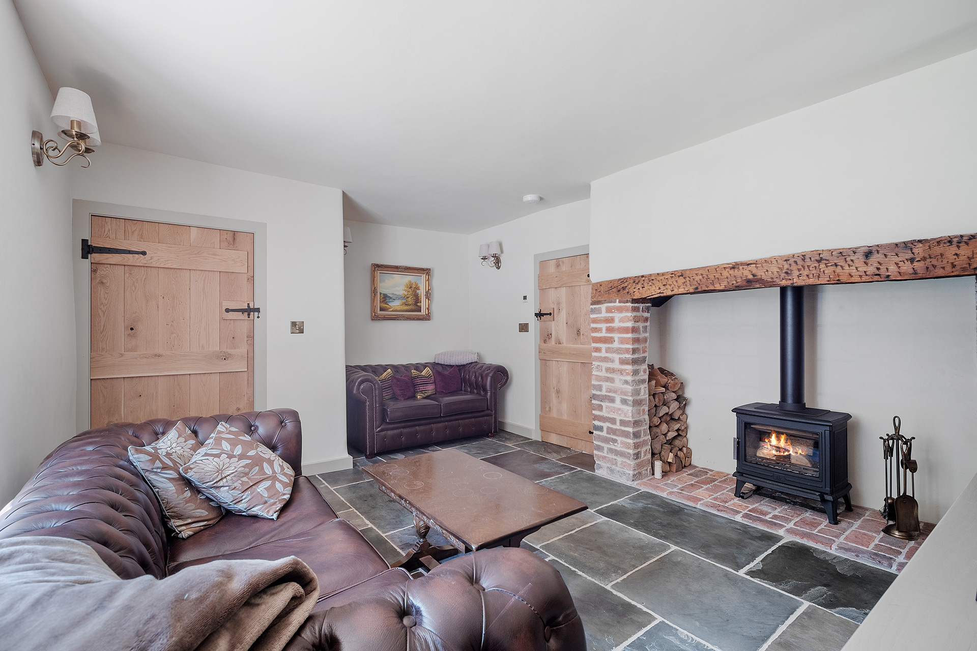 cosy living room area with log burner