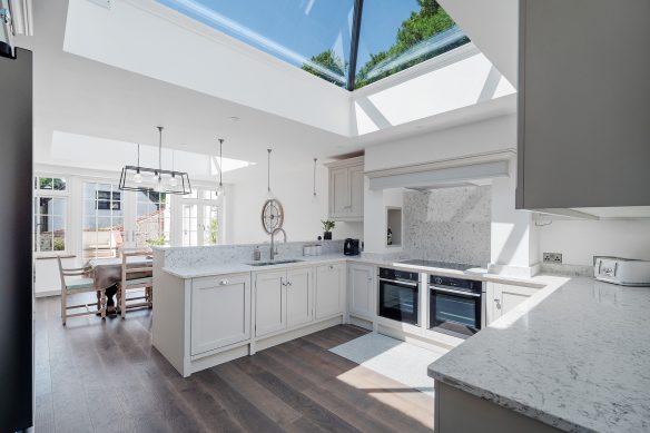 open plan modern kitchen dining area with rooflight