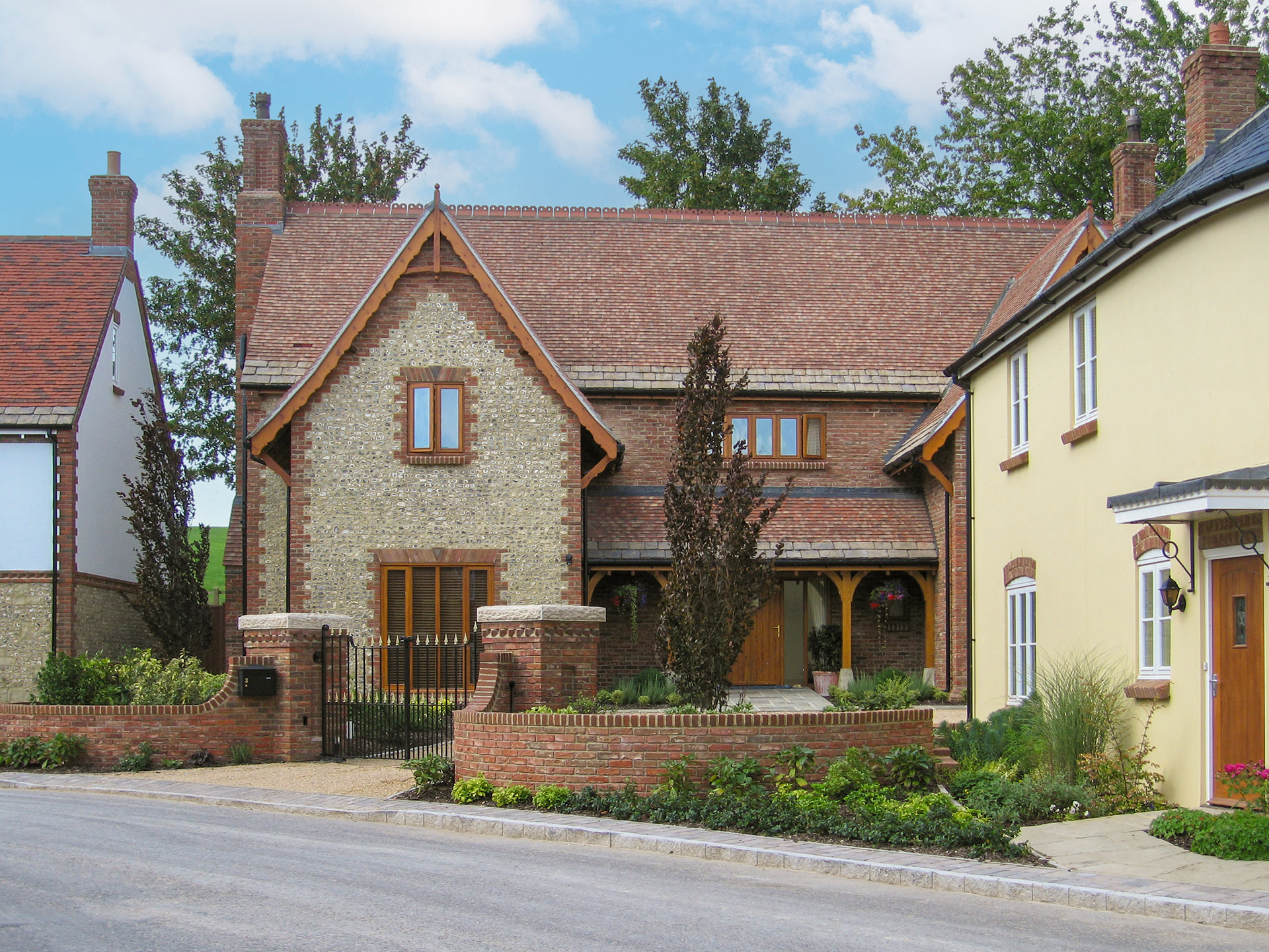 front view from across road of two houses