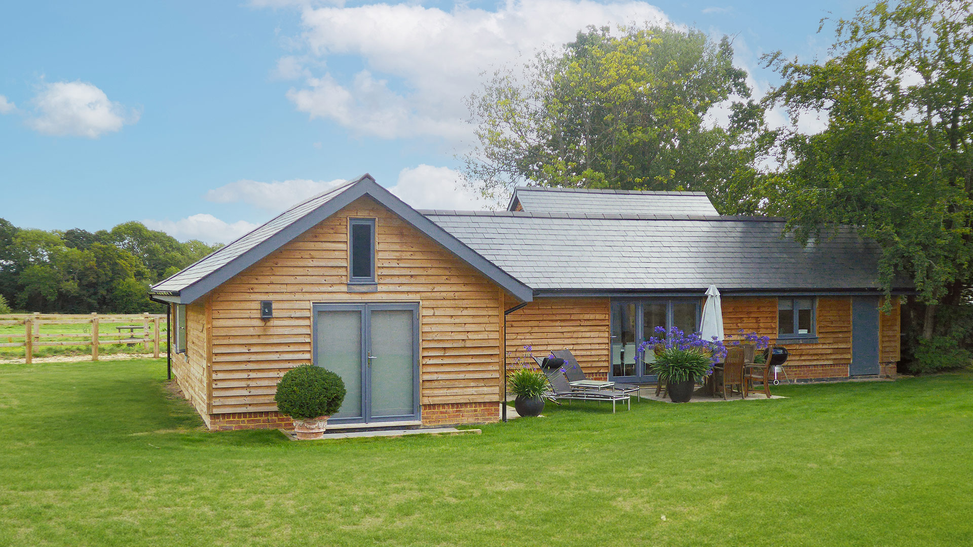 Class Q barn conversion with timber cladding