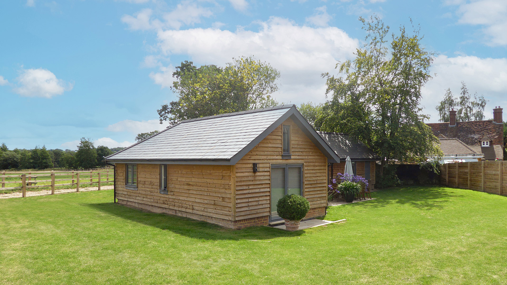 Class Q barn conversion with timber cladding