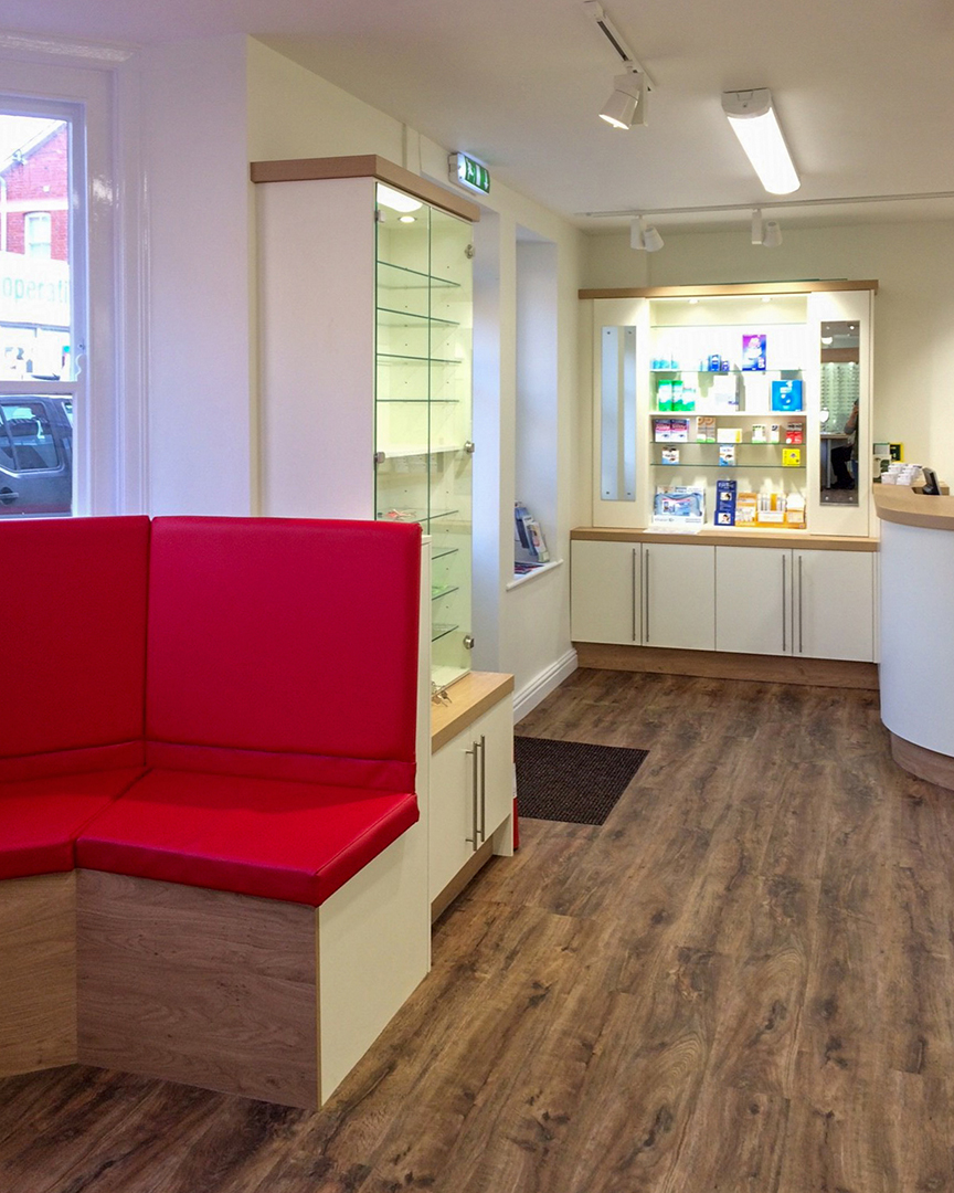 opticians shop with display area and seating area