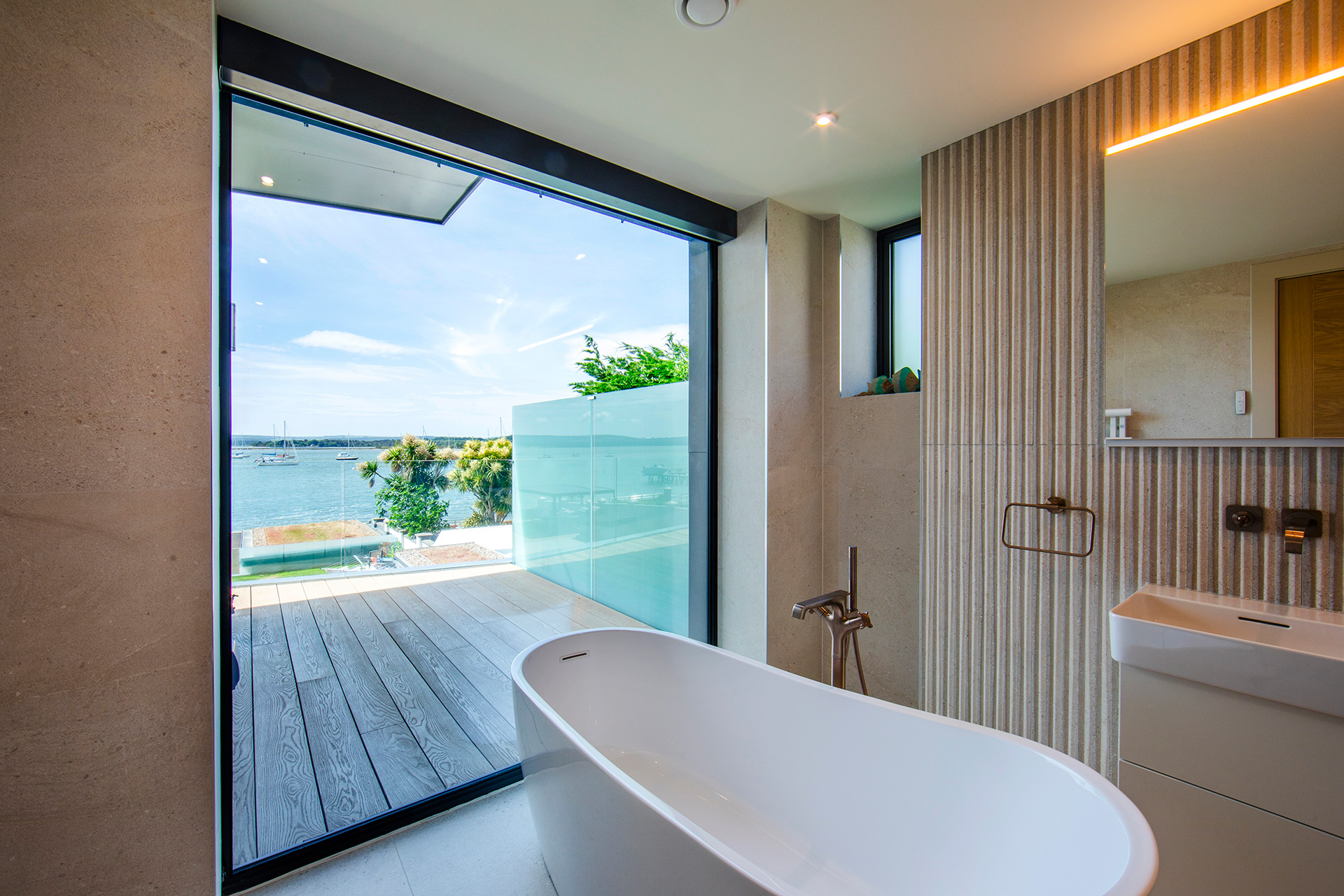 modern interior bathroom with beautiful sea views