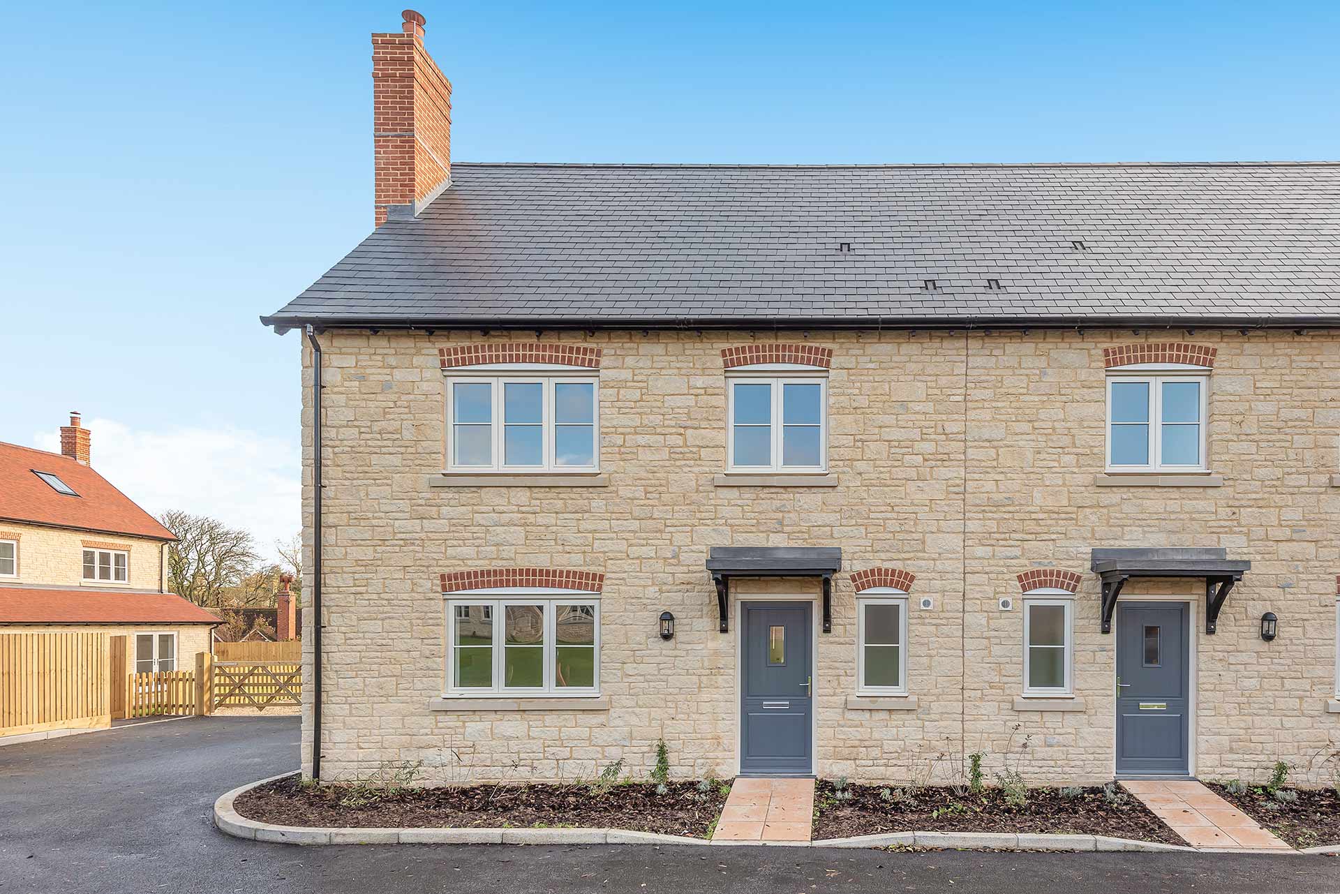 end of terrace new build stone cottage
