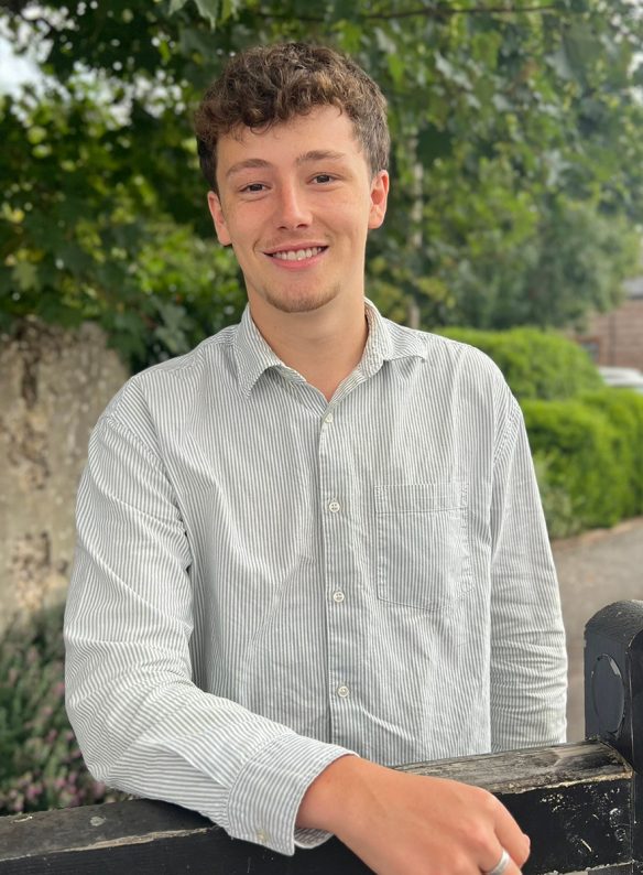 employee smiling at camera