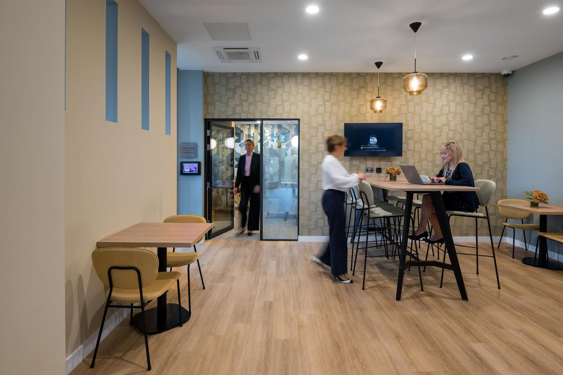 commercial interior seating area with high tables