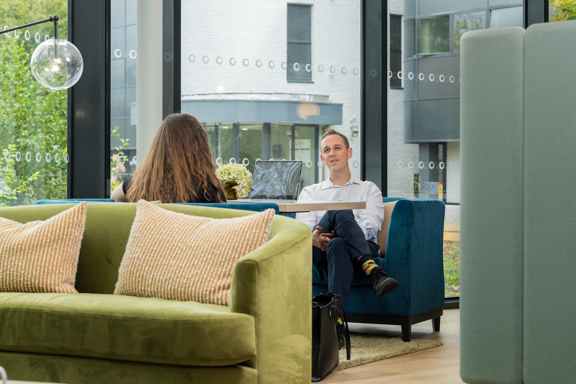 commercial interior office seating break out space with large windows