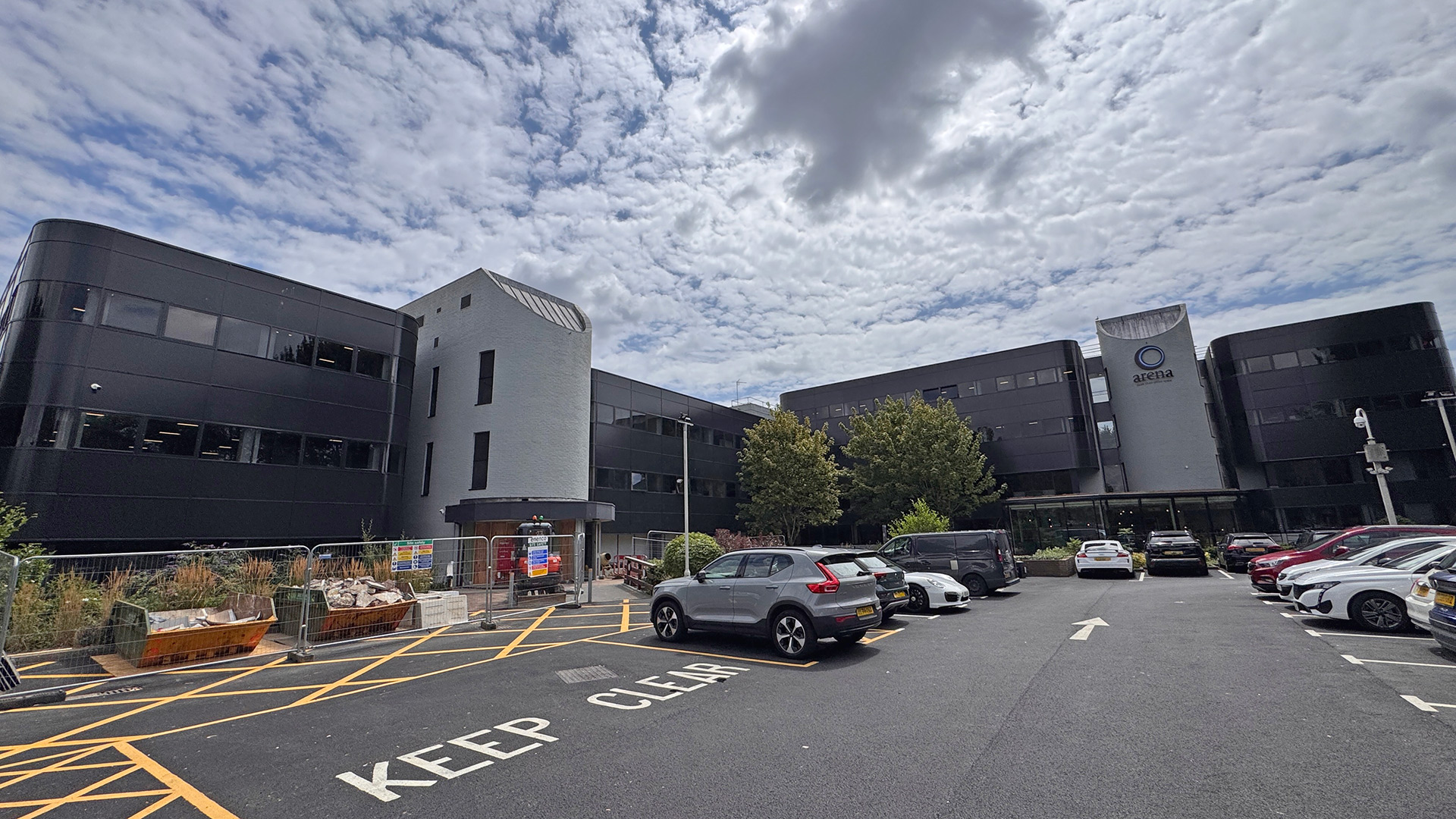 Contemporary office buildings with car park in front