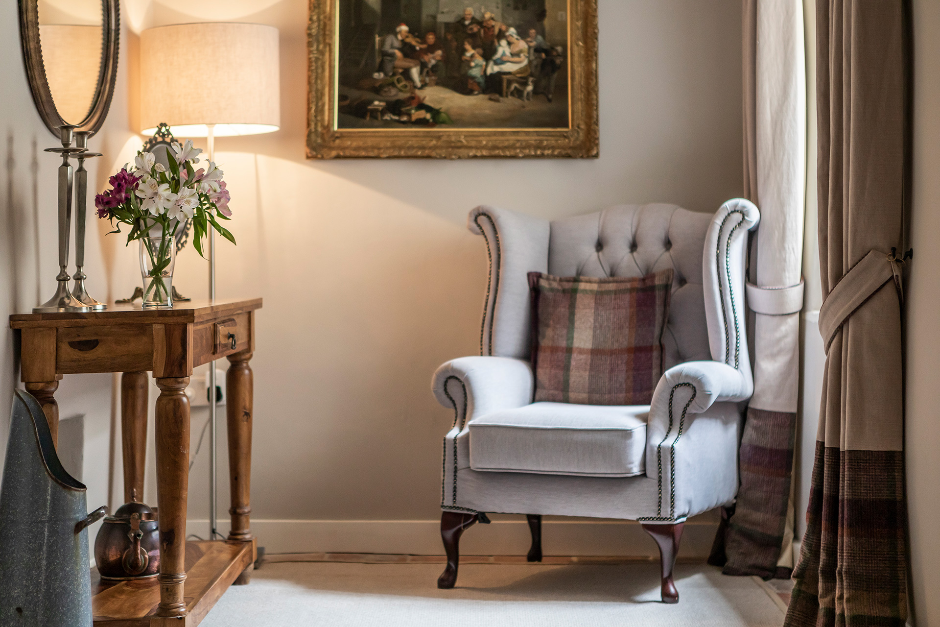 seating area with armchair and side table