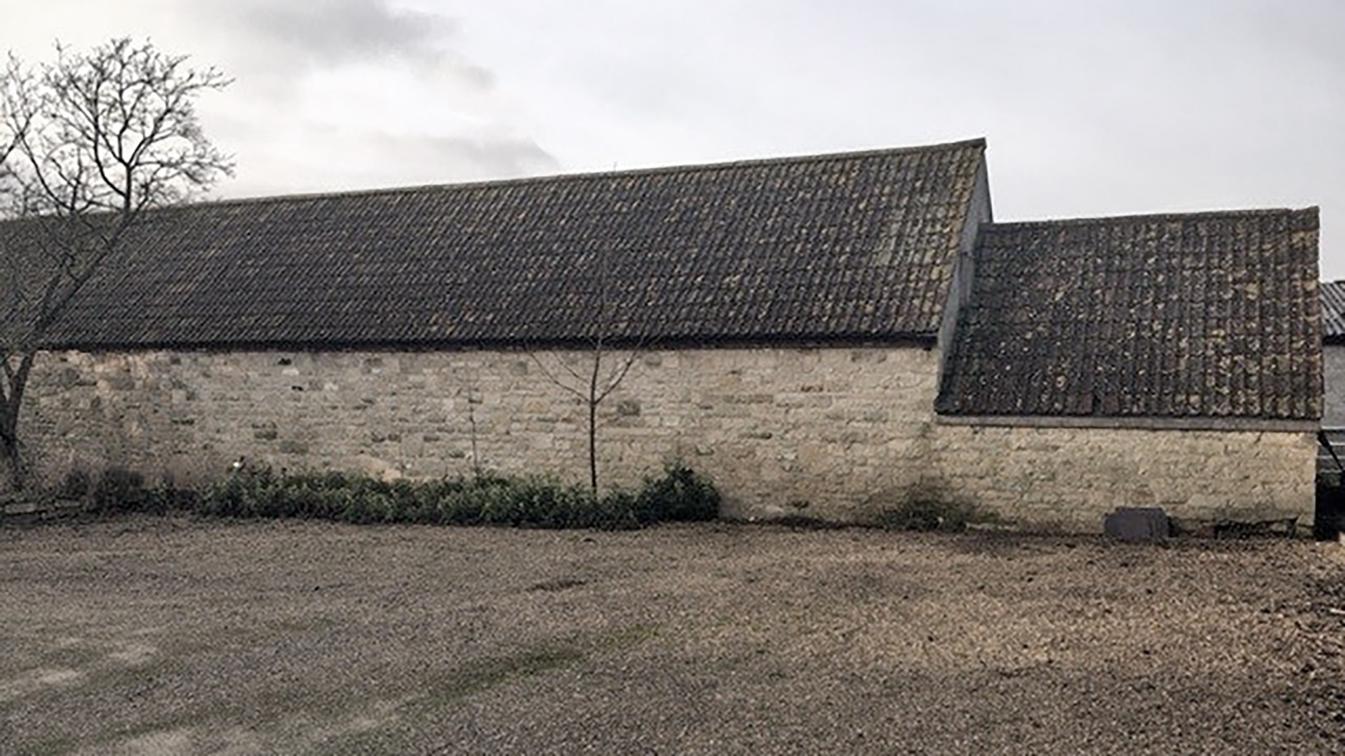 Class Q barn conversion with stone walls and tiles roof