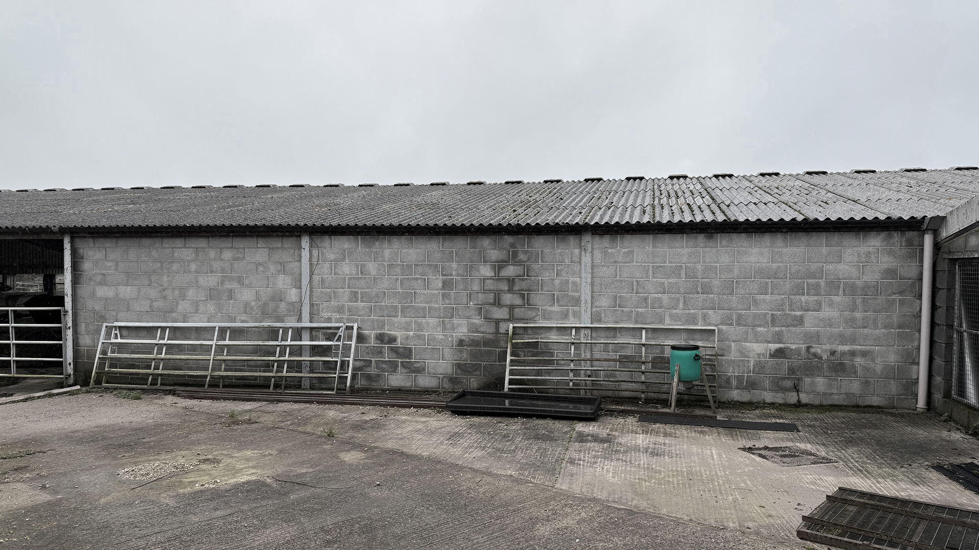 Existing class q barn conversion with breeze block wall and tiled roof