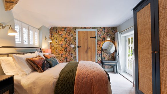 Residential interior bedroom with feature wallpaper