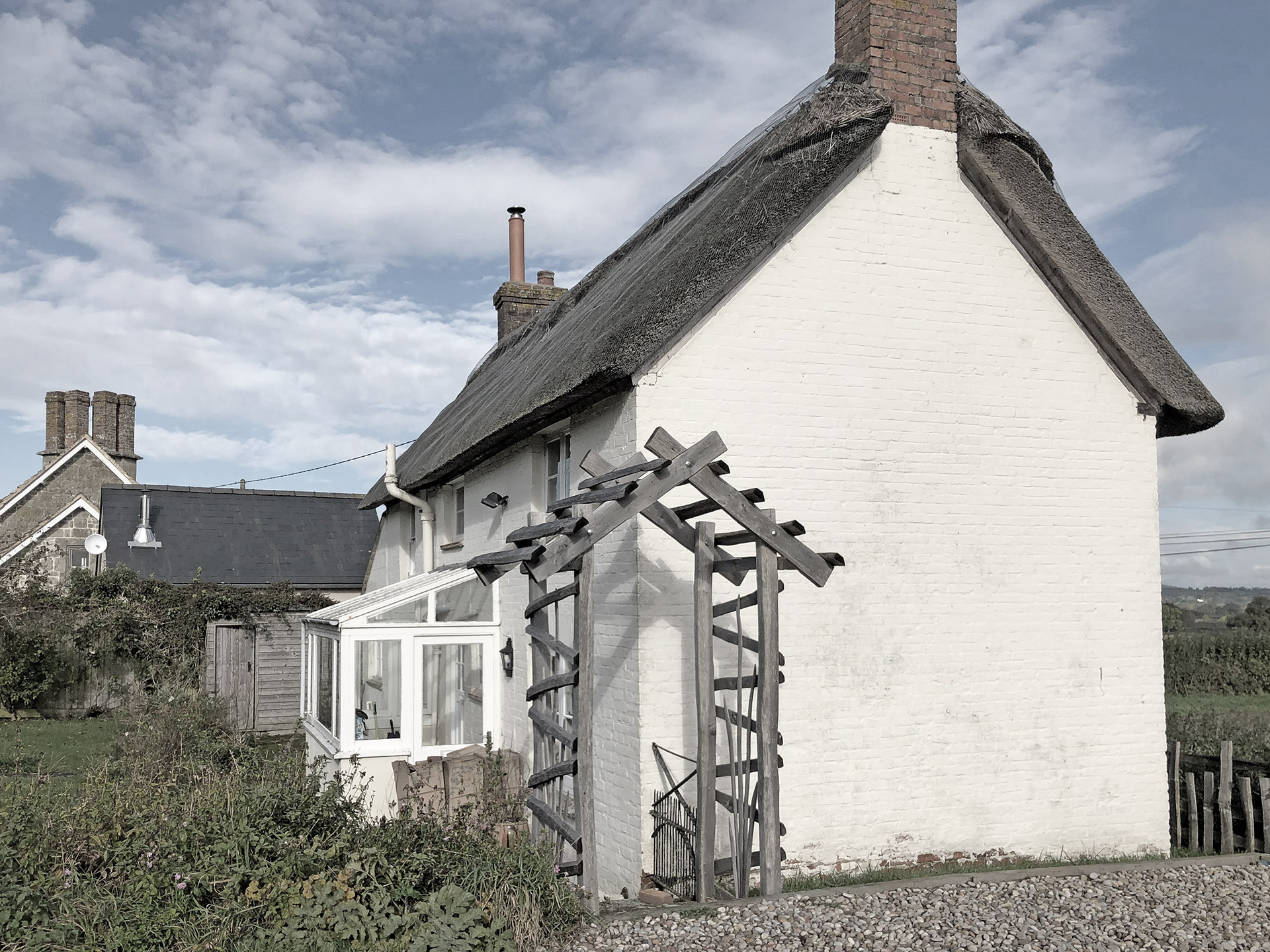Before photo of traditional thatched house