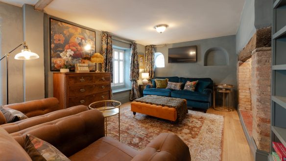 Living room cosy interior with exposed brick fireplace