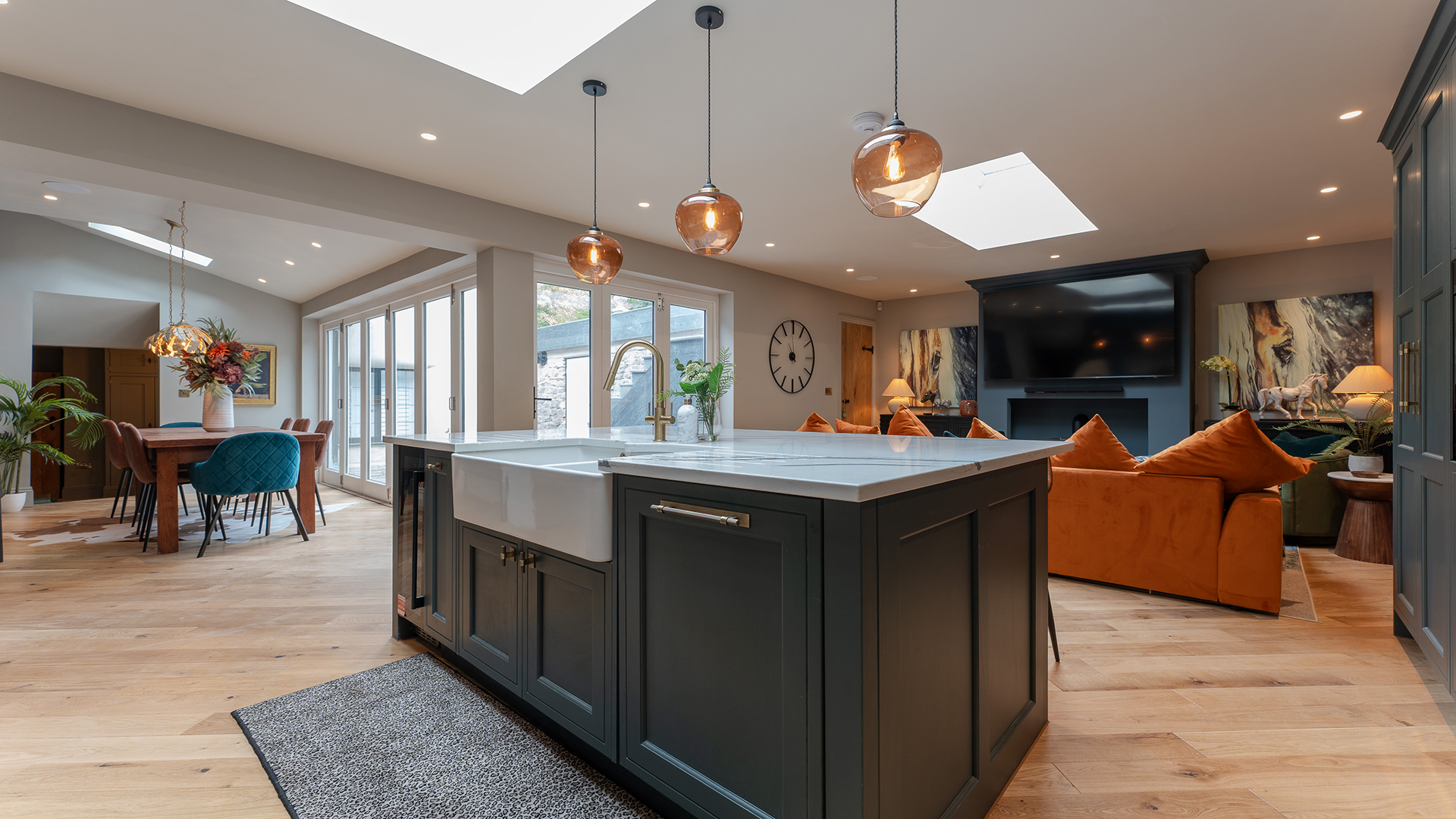 Open plan kitchen, dining and living room with kitchen island