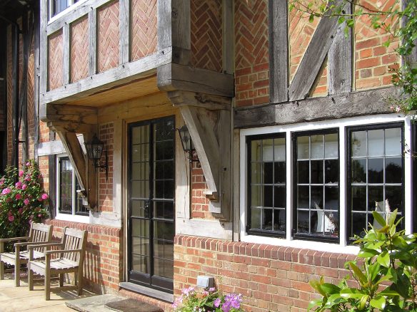 detail photo of windows and door on historic residential house