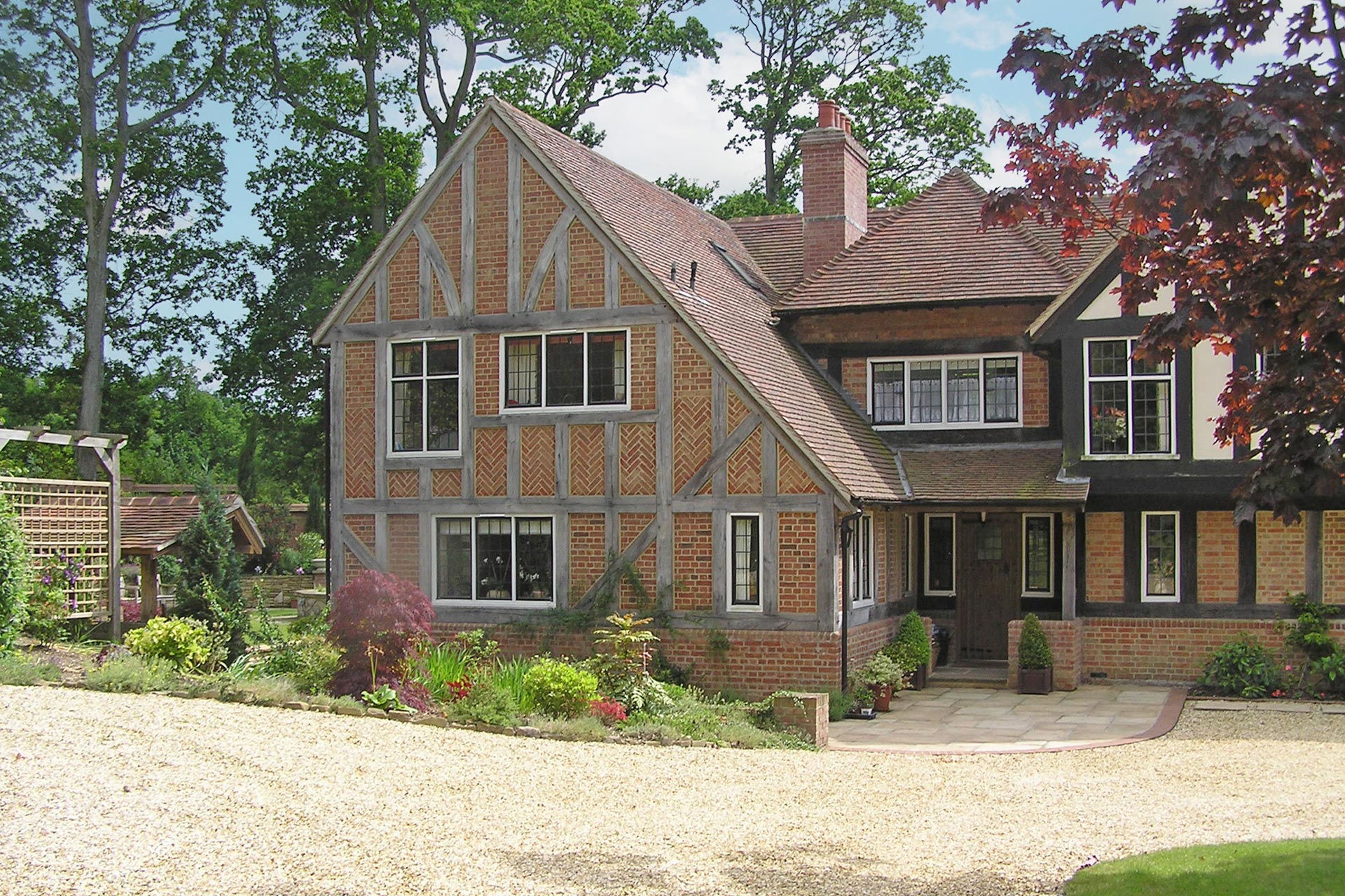 Approach view to historic residential house with extension