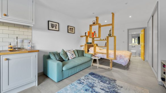 open plan modern interior of annexe in white tones