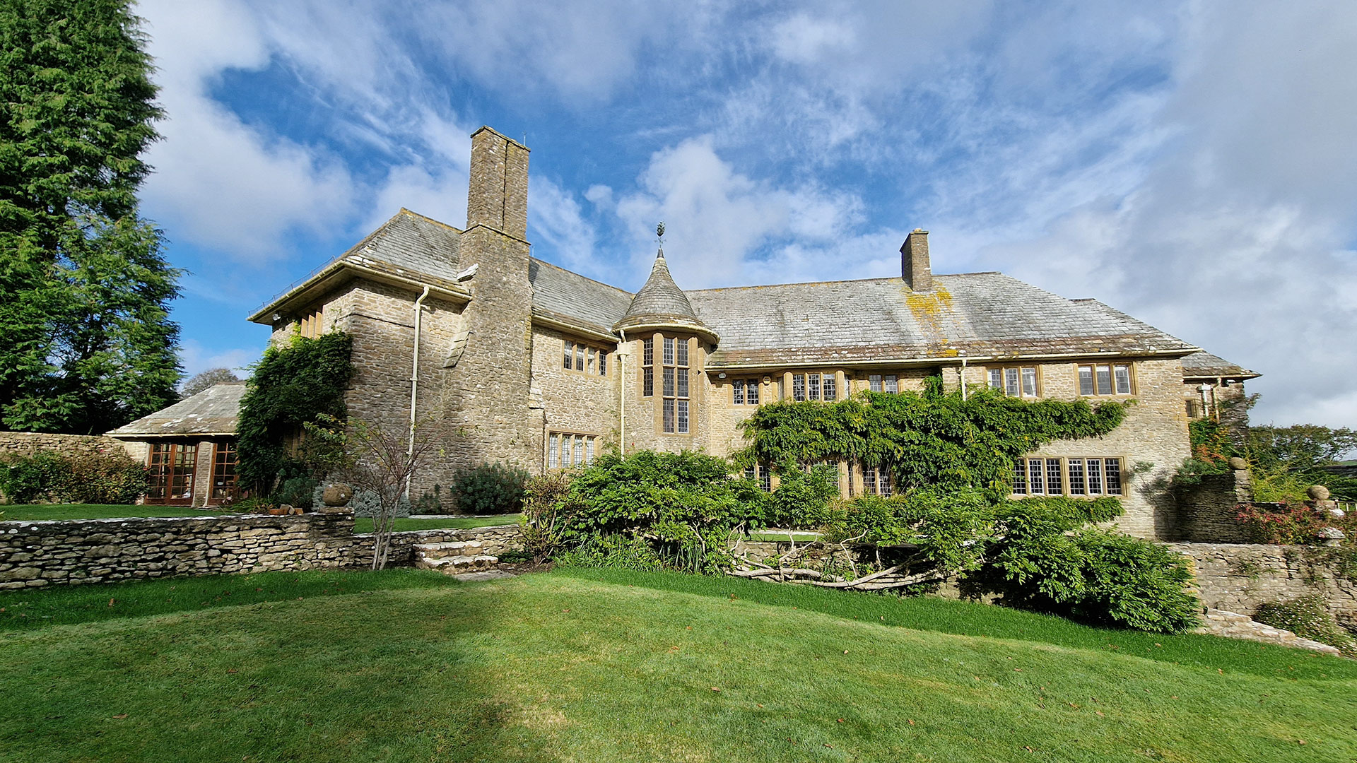 before photo of rear view of large heritage listed house
