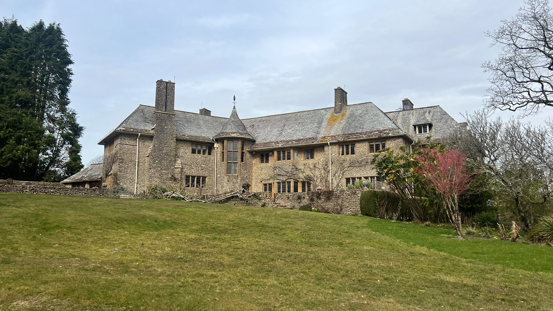 before photo of rear view of large heritage listed house