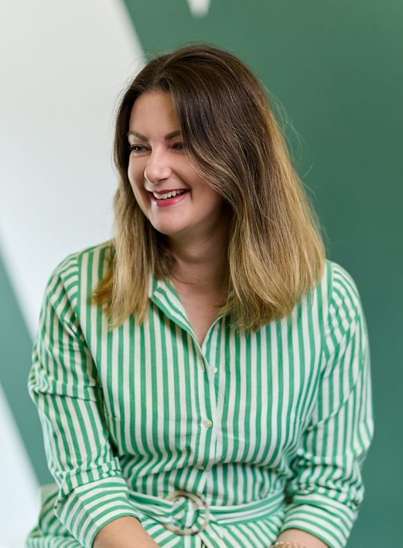 lady in white and green shirt dress