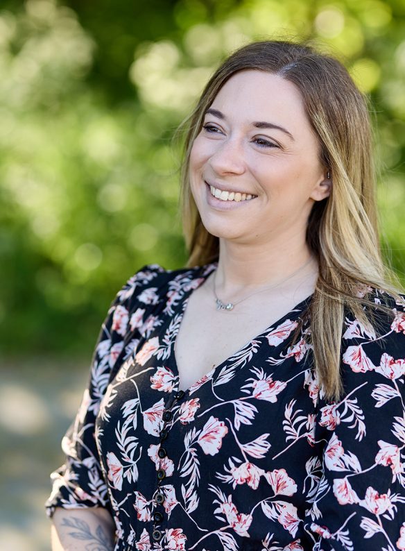 young lady in a floral dress and long hair