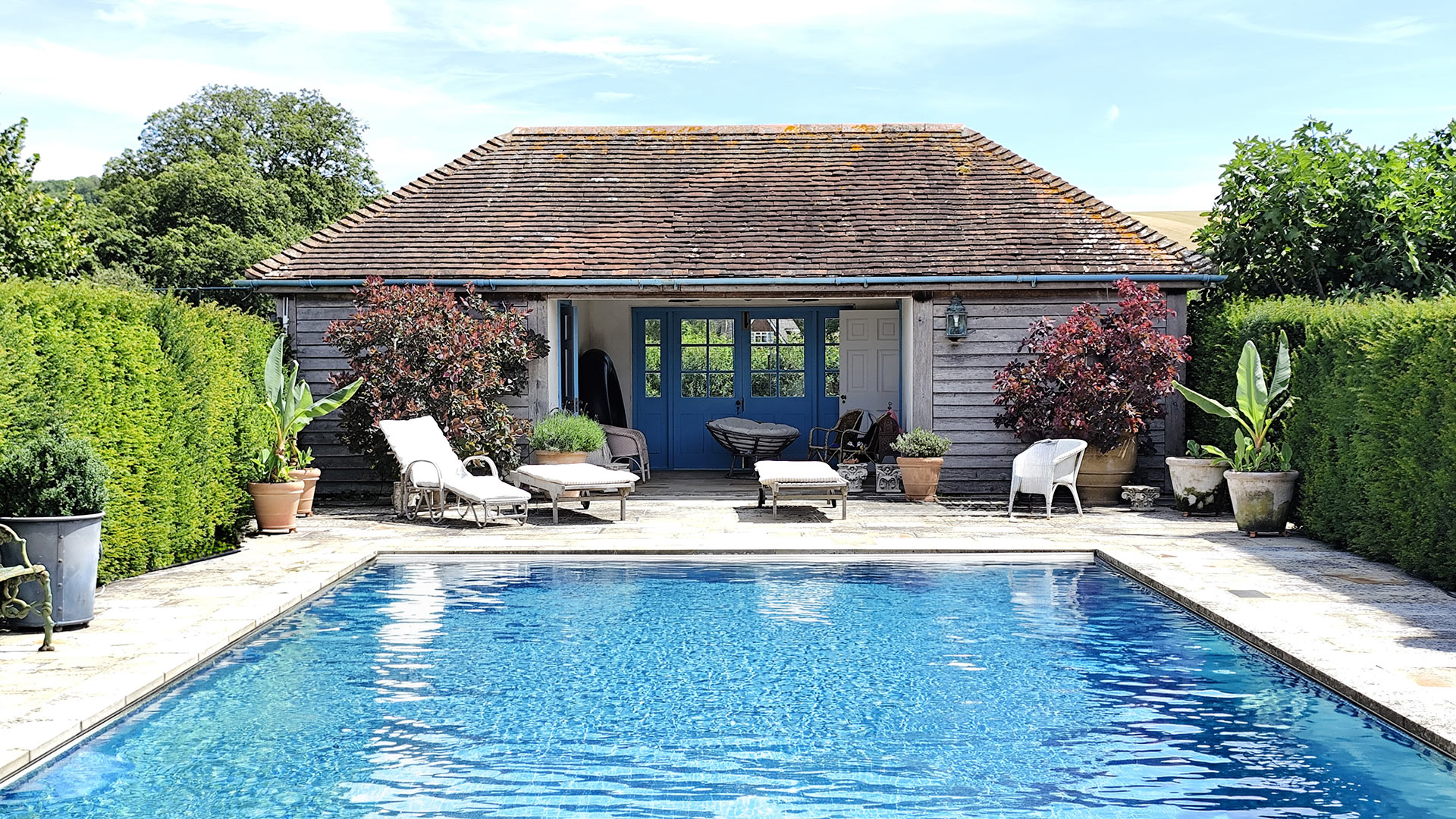 Attractive traditional style timber clad pool house